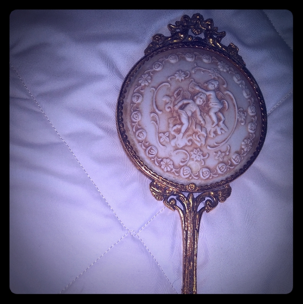 Ivory hand mirror